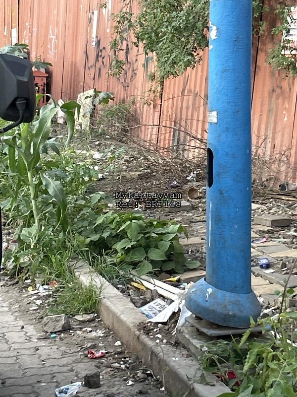 Broken footpath and leaves
